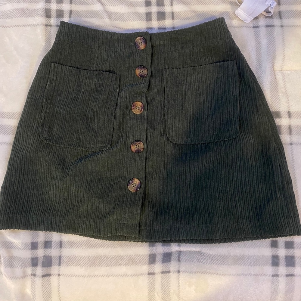 Green mini skirt